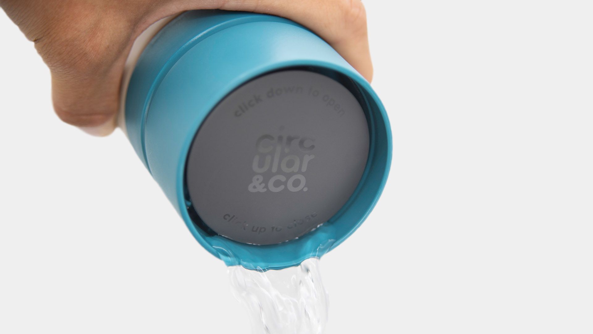 reusable water bottle pouring water
