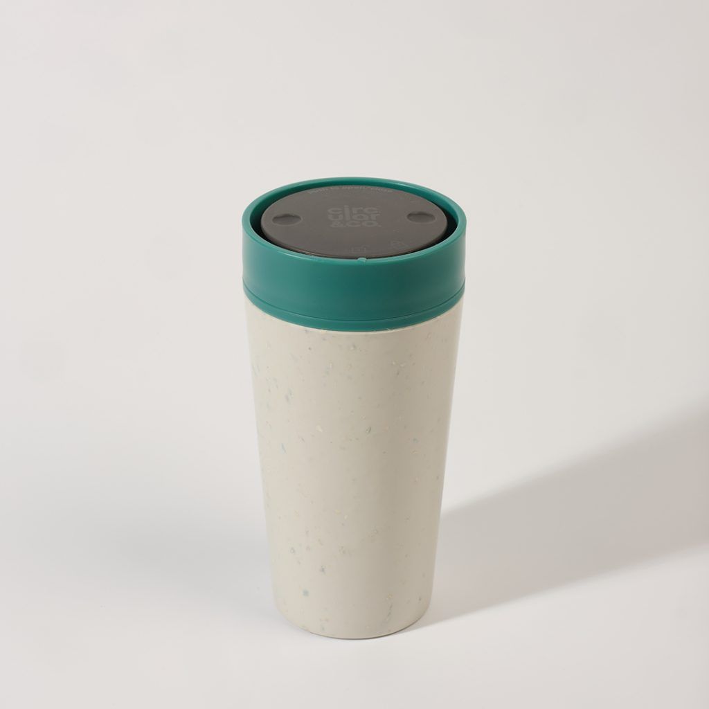 white reusable cup with blue lid