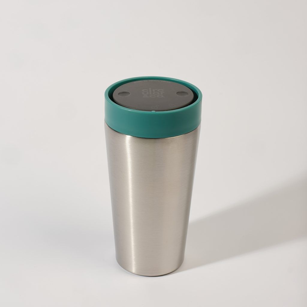 steel reusable cup with green lid