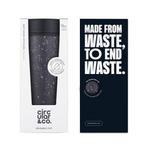 black reusable cup with black lid in cardboard packaging