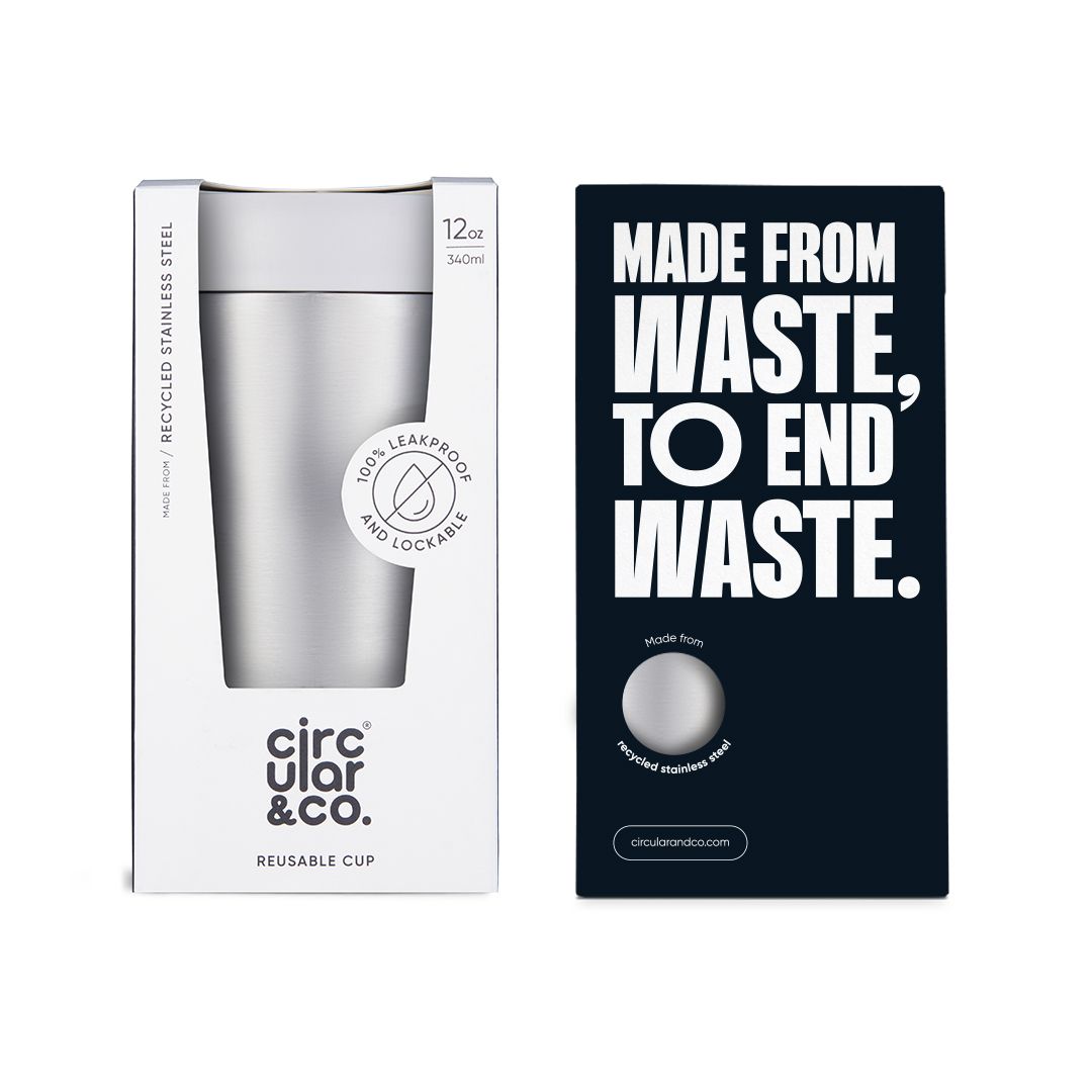 steel reusable cup with white lid in cardboard packaging