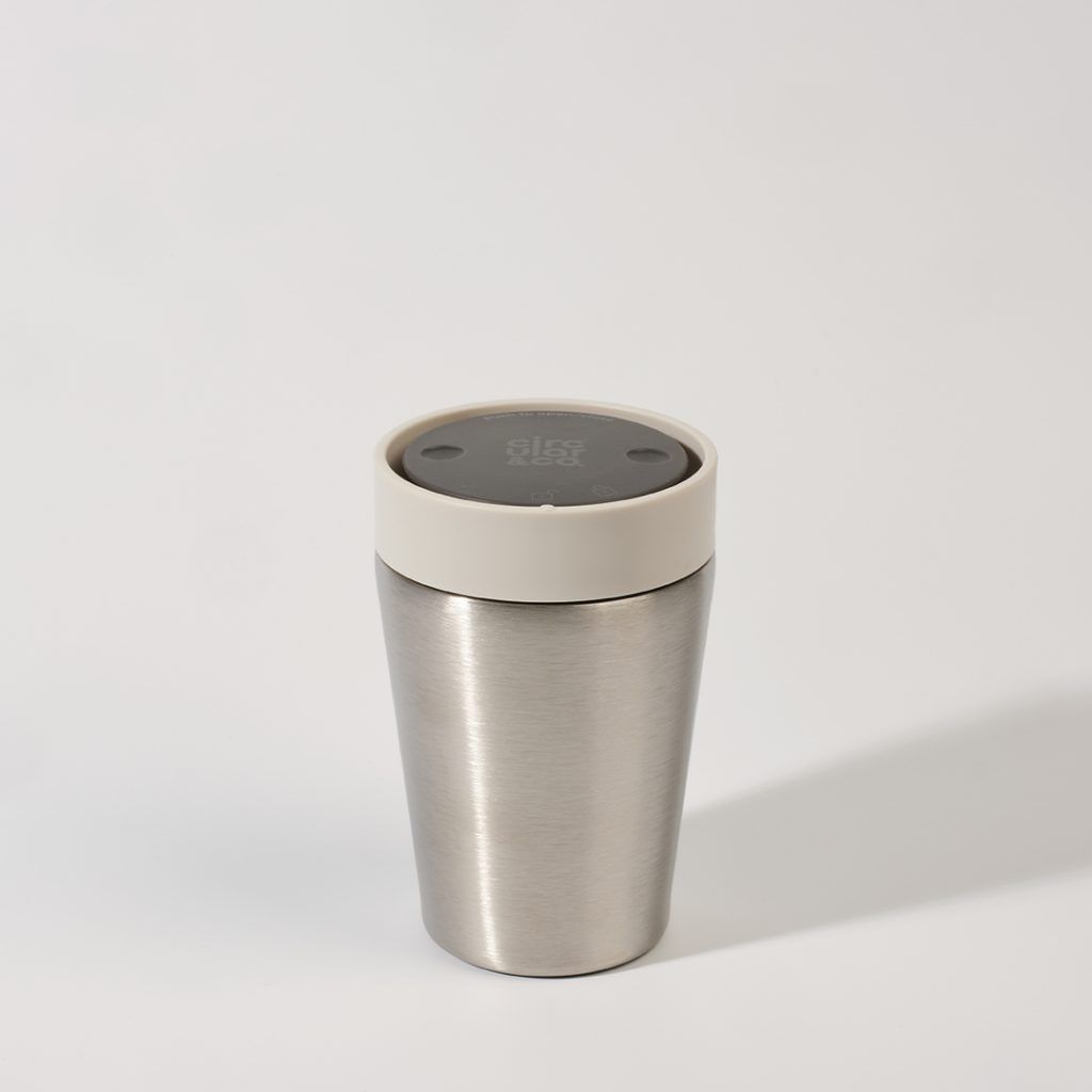 steel reusable cup with white lid