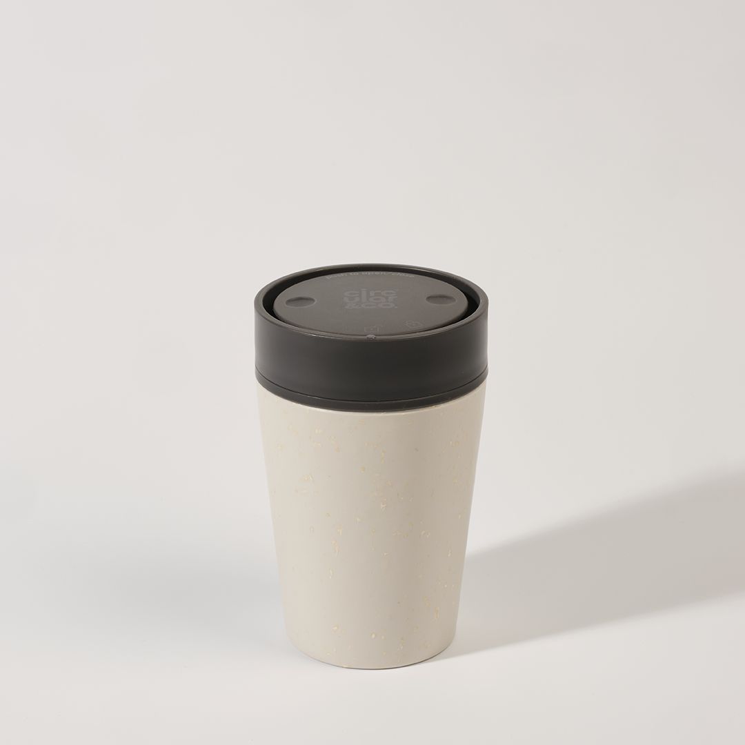 white reusable cup with grey lid