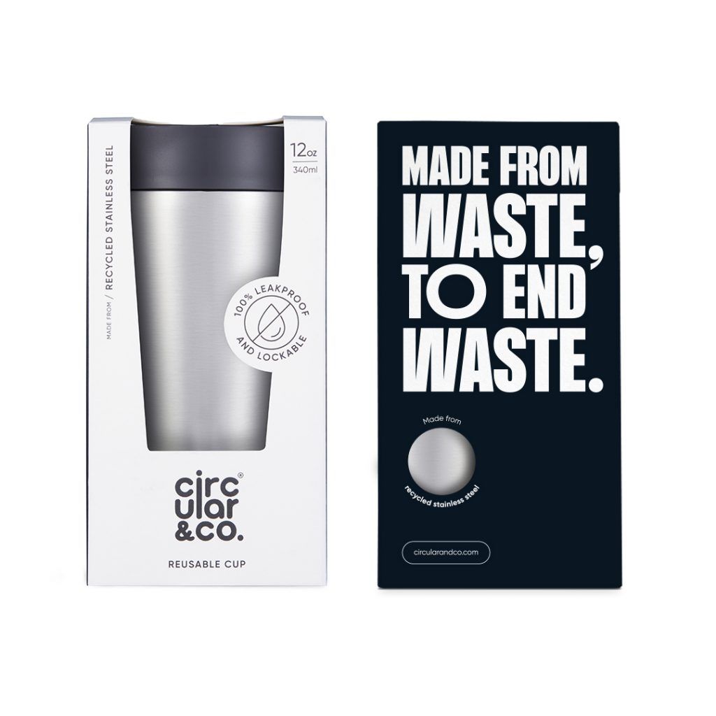 steel reusable cup with black lid in cardboard packaging