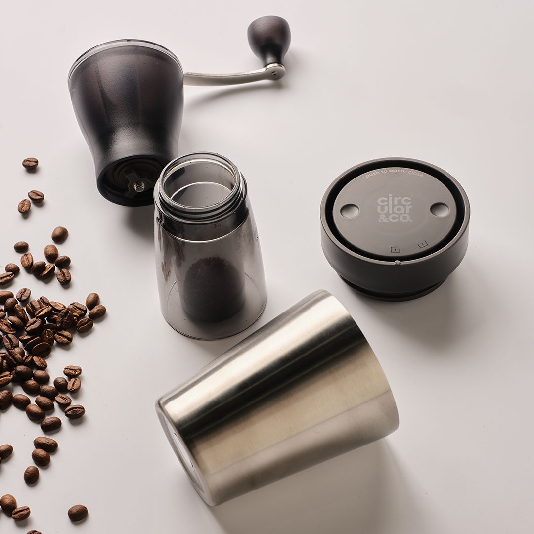 coffee grinder and steel reusable cup