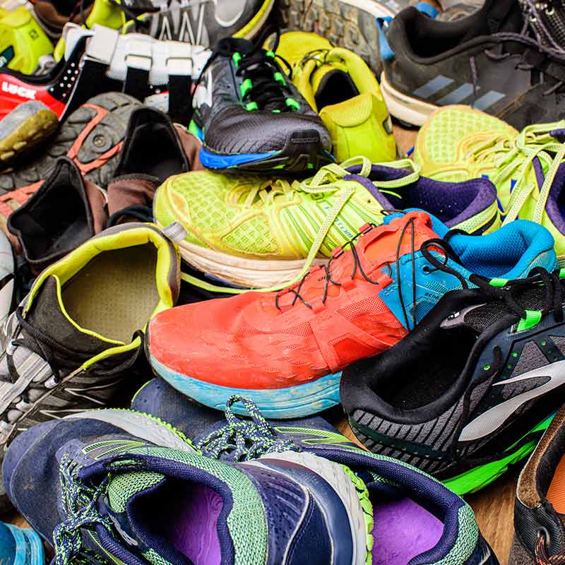 various old trainers and shoes